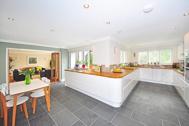 Open concept kitchen with smart technology and sustainable materials in 2025