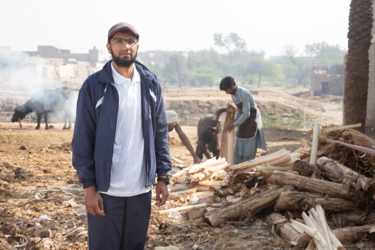 worker collecting banana fiber
