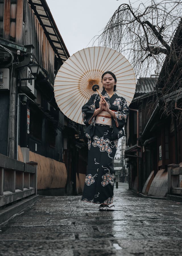 Kyoto cultural experience – Geisha walking in Gion District at dusk