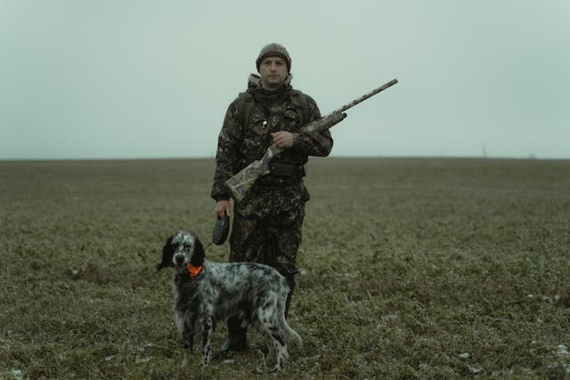 A hunter with his dog